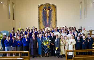 Pupils from our three parish schools and fellow Sisters from the Cross and Passion help Sr. Maria Varley celebrate her Golden Jubilee in St. Andrew's Church, Teesville.
